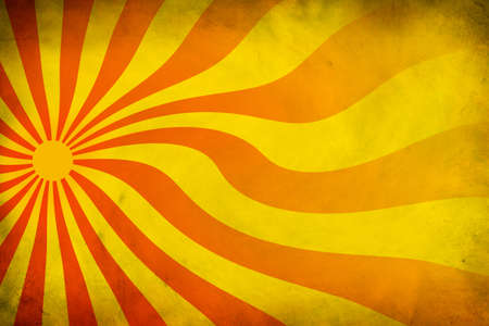 Curvy sunburst with bright orange rays on a dirty, grungy backgroundの写真素材