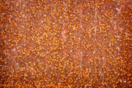 Grungy rusted copper looking metal sheet background to be used as a background or banner
