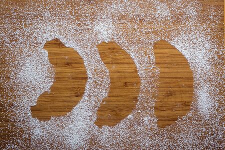 tasty fresh croissants sprinkled with powdered sugar.Delicious continental breakfast with fresh flaky croissants,close up croissants.Fresh homemade croissant.bakery products,sweetsの写真素材
