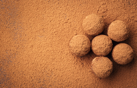 Chocolate truffle,Truffle chocolate candies with cocoa powder.Homemade fresh energy balls with chocolate.Gourmet assorted truffles made by chocolatier.Chunks of chocolate and coffee beansの写真素材