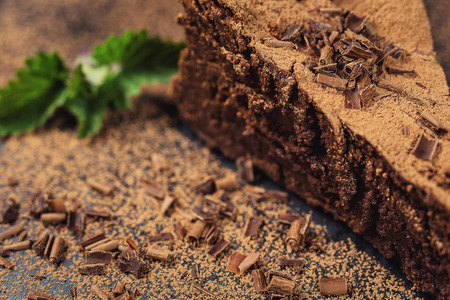 chocolate cake with Candies,Chocolate cake with a cut piece and blade on gray background, closeup,Dark chocolate cake,Delicious vegan chocolate cake,Tasty chocolate cake on wooden backgroundの写真素材