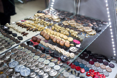 vintage clothes buttons with variety color on sell in marketの写真素材