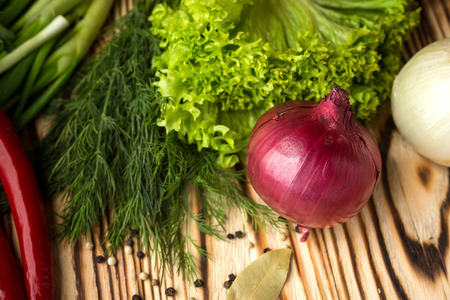 Composition with assorted raw organic vegetables such as onions, herbs, lettuce and pepper. Detox dietの写真素材