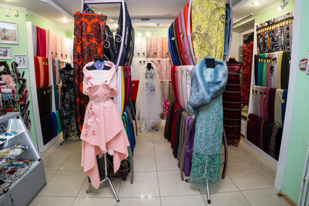 18 of December, 2017 - Vinnitsa, Ukraine. Various textiles for sale in fabric shop, drapery store.のeditorial素材