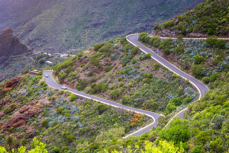 Mountain serpentine. Landscape of the Masca Gorge. Beautiful views of the coast with small villages...