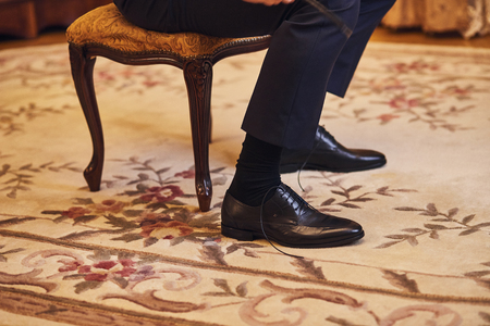 businessman clothes shoes, man getting ready for work,groom morning before wedding ceremonyの写真素材
