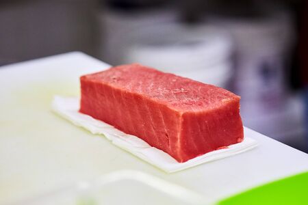 Steak of  Tuna Fish Fillet on a cutting board - Fish and Seafoodの写真素材
