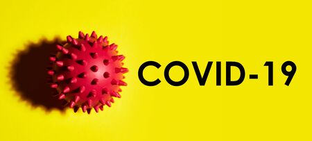 Inscription COVID-19 on yellow background.
disease named: Coronavirus, COVID-19 SARS, Coronaviridae...