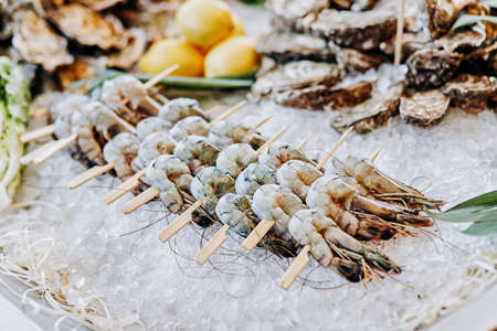 Fresh Shrimp lies on ice in the fish shopの写真素材