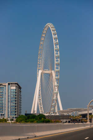 Dubai, UAE - November 06, 2021:  Ain (Eye) DUBAI - One of the largest Ferris Wheels in the World, located on Bluewaters island. Top tourist attractions in the United Arab Emiratesのeditorial素材