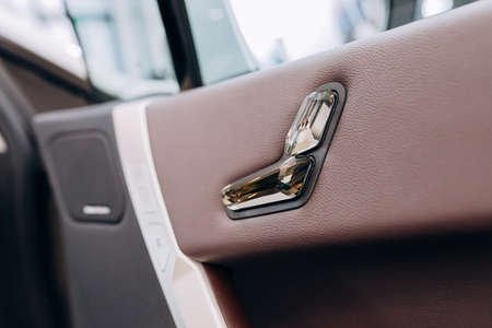 Vinnitsa, Ukraine - January 14, 2022. BMW IX - new model all-electric SUV car presentation in showroom - door handleのeditorial素材