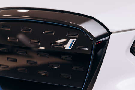 Vinnitsa, Ukraine - January 14, 2022. BMW IX 3- new model all-electric SUV car presentation in showroom - element of bumperのeditorial素材