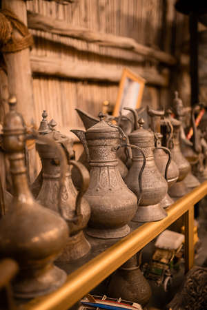 Dubai, UAE, 07 November 2021: Arab market in Al Seef with crockery, lamps and lanterns in the old styleのeditorial素材