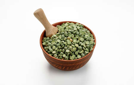Green pea groats isolated on a white background. High quality photoの写真素材