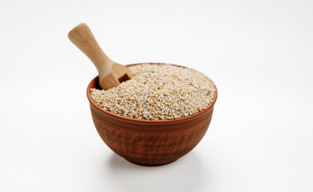 Barley groats in bowls and bags isolated on a white background. High quality photoの写真素材