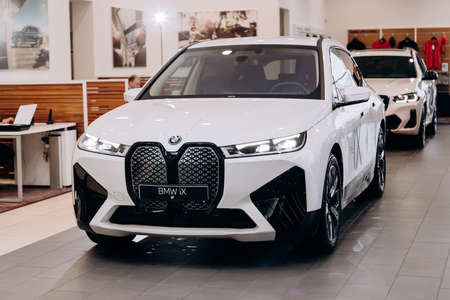 Vinnitsa, Ukraine - January 14, 2022. BMW IX - new model all-electric SUV car presentation in showroom - side viewのeditorial素材