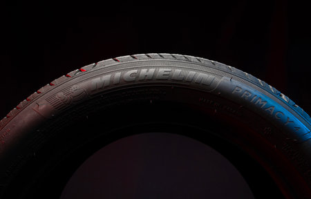 09 of April 2022 - Vinnitsa, Ukraine. New car tire Michelin Primacy 4 plus. Road wheel on dark...