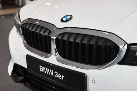 Vinnitsa, Ukraine - February 24, 2021. Close up of BMW Series 3 - new model car presentation in showroomのeditorial素材