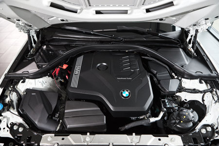 Vinnitsa, Ukraine - February 24, 2021. Under the hood of BMW Series 3 - new model car presentation...
