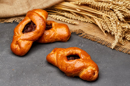 Golden-brown pastries filled with fruit jam, perfect for a delicious breakfast or sweet snack