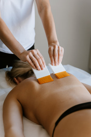 Professional body brushing technique for a rejuvenating spa massage experience