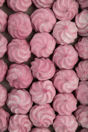 Pink homemade marshmallow candies in rows. Sweet dessert background, top viewの写真素材