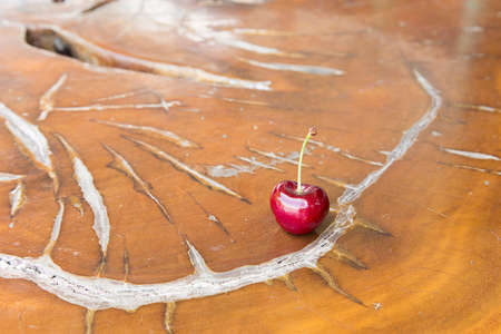 fresh cherry on wood tableの写真素材