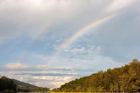 double rainbow after the rain.の写真素材