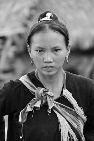 BOKEO,LAO PDR-JULY 21,2011 LANTAEN teen mom on  July 21,2011 in Nam chang village, Bokeo province, Lao pdr.のeditorial素材