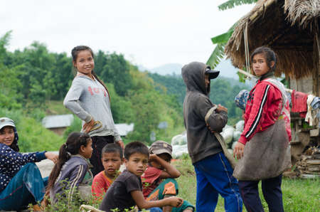 VIANGPHOUKHA, LUANGNAMTHA , LAO P D R MAY 31   Group of Unidentified Khmu ethnic children 12-15 years old pose for photo on May 31, 2013 in Viangphoukha,Luangnamtha,Lao pdrのeditorial素材