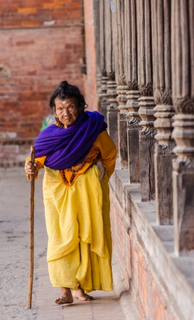 KATHMANDU, NEPAL - DECEMBER 04  An elderly woman walks in the Social welfare center Briddhashram  Elderly s home  on December 04, 2013 in Kathmandu, Nepalのeditorial素材