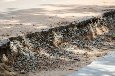 Soil under asphalt surface roadの写真素材