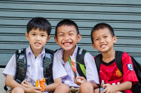 UBONRATCHATHANI,THAILAND -SEPTEMBER 6   Unidentified village school students 12 years old gather for photograph during their break time on September 6,2013  in Ubonratchathani,Thailandのeditorial素材