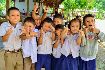 BAAN MAE- OR , MAE CHAEM, CHIANGMAI, THAILAND, JUNE 10   Unidentified Karen ethnic kids are showing thumbs up sign at their primary school  on June 10,2014 Mae chaem,Chiangmai,Thailand  のeditorial素材