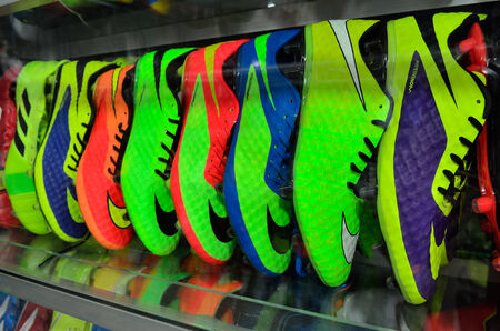 KAP CHOENG,SURIN,THAILAND-APRIL 24  Rows of colorful sport shoes at the  Chong Jom market near...