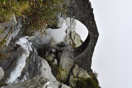 Ancient Romanesque bridge over the Chiusella stream, in Piedmontの写真素材