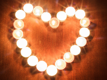 Photograph of candles on black backgroundの写真素材