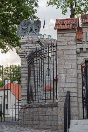 Tallinn, Estonia on 13 June 2019 the Maarjamae Palace is an interesting and beautiful attraction of the city. The cast-iron lattice of the entrance gate is decorated with stone statues of eaglesのeditorial素材