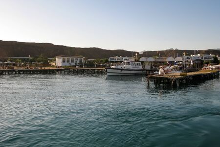Sharm El Sheikh, Egypt, 27 November 2017, Marina for pleasure and excursion boats, Egyptian police boat on the pier keeps orderのeditorial素材