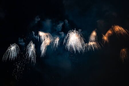 Colorful firework with bokeh background with copy space for New Year celebration, Abstract holiday backgroundの写真素材