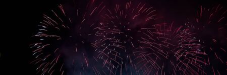 Colorful firework with bokeh background with copy space for New Year celebration, Abstract holiday...