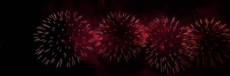 Colorful firework with bokeh background with copy space for New Year celebration, Abstract holiday backgroundの写真素材