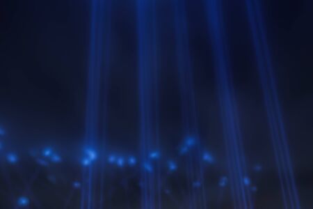 Rays of light beat up at nightの写真素材