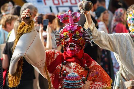 Moscow, Russia, 09.09.2019. Theatrical performance in the city center. Moscow celebrates City Day. The procession of a group of actors in fatasmagoric costumes of the East.のeditorial素材