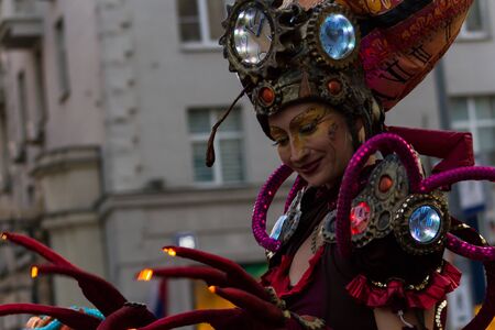 Moscow, Russia, 09.09.2019. Theatrical performance in the city center. Moscow celebrates City Day. The procession of a group of artists on stilts.のeditorial素材