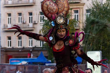Moscow, Russia, 09.09.2019. Theatrical performance in the city center. Moscow celebrates City Day. The procession of a group of artists on stilts.のeditorial素材