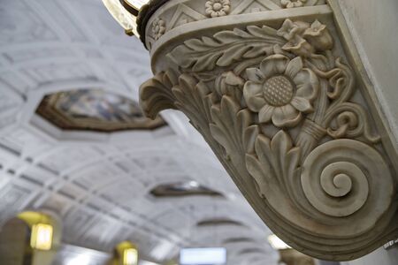 Moscow, Russia 10.13. 2019 Belorusskaya metro station near Belorussky railway station. Beautiful bright lobby. The design element of the station lobby is marble stands for lamps.のeditorial素材