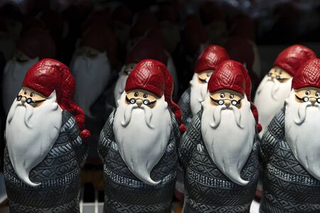 New Year's funny Santa Claus in glasses on a dark blurred background.
