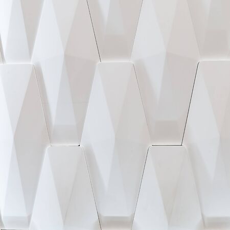 3D decorative wall for the interior of an unusual geometric shape. White light background with a pattern imitating a tree. Abstract textureの写真素材
