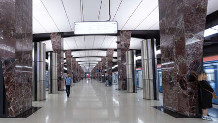 Moscow, Russia May 26, 2019. Interior of a modern metro station. The subway station in Moscow Khoroshevskaya. Simple design, marble finish, beautiful color combination.のeditorial素材
